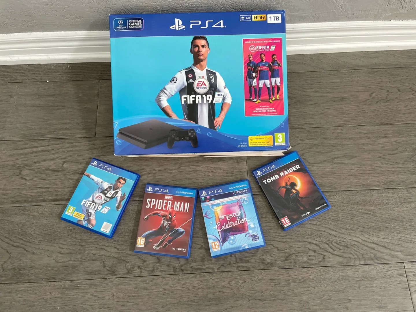 Boxed PS4 1TB Console with 4 Games and Extra Controller image indicator(2)
