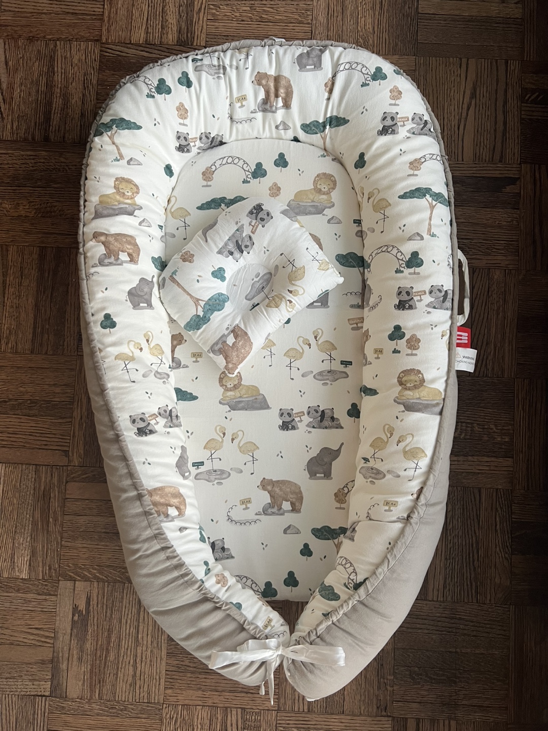 Baby Nest with Safari Animals Print and pillow