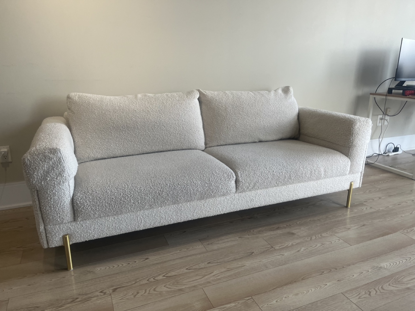 Cream-coloured Loveseat/sofa with Gold Legs