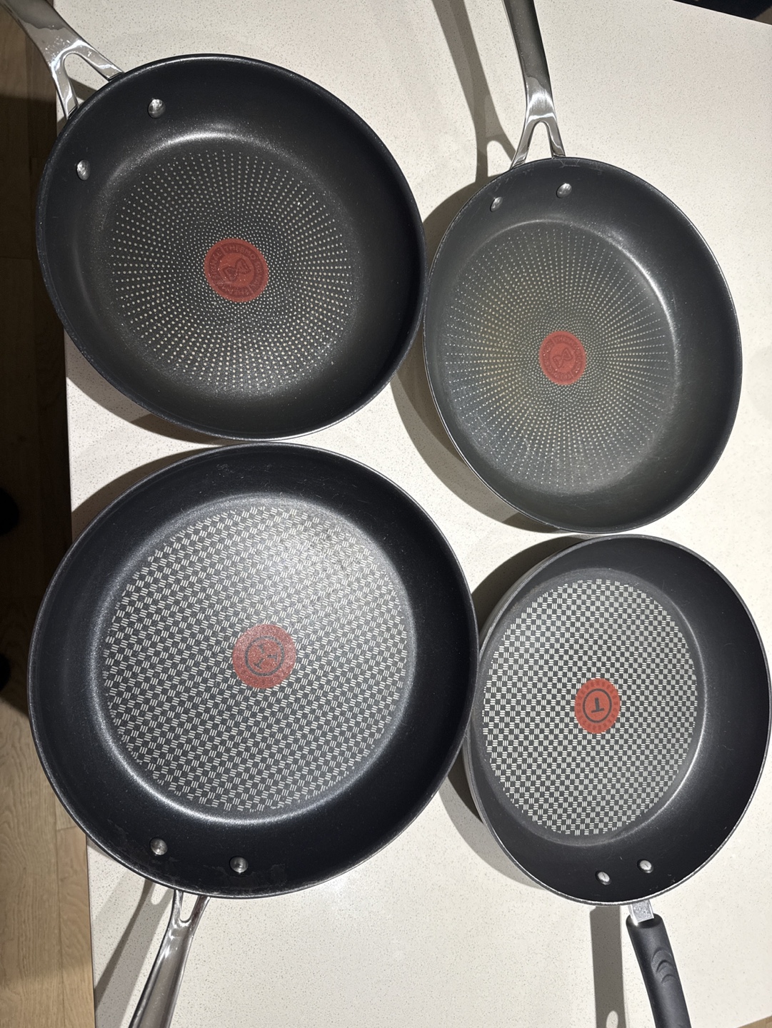 Set of four T-fal frying pans