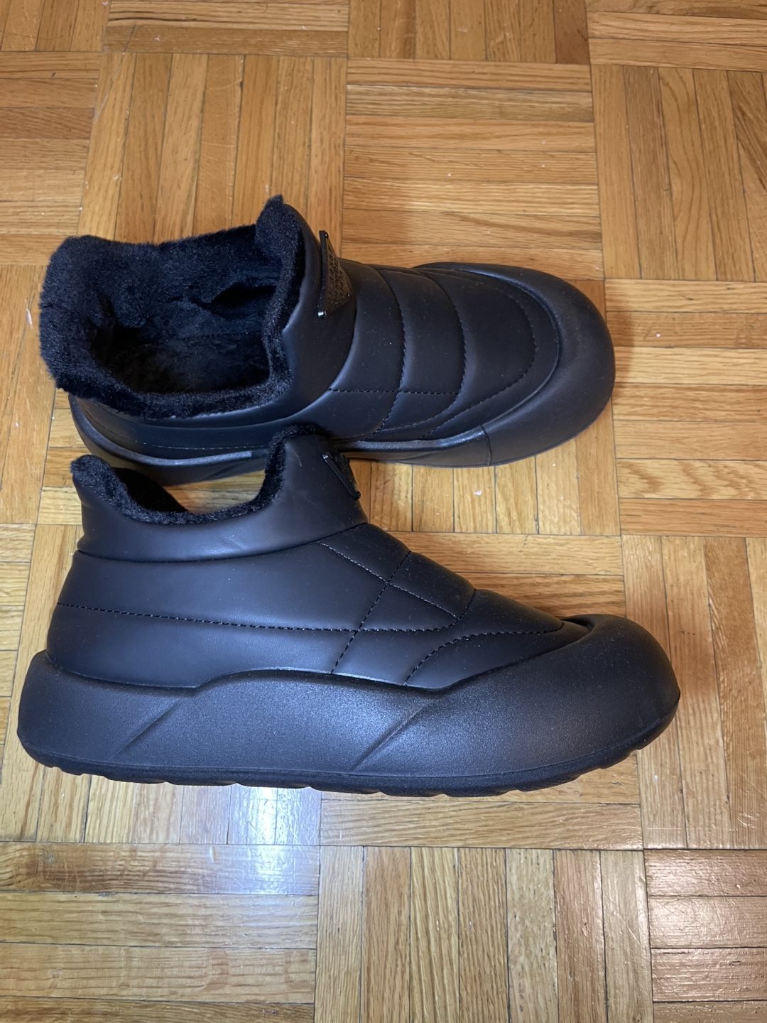 Black quilted winter boots