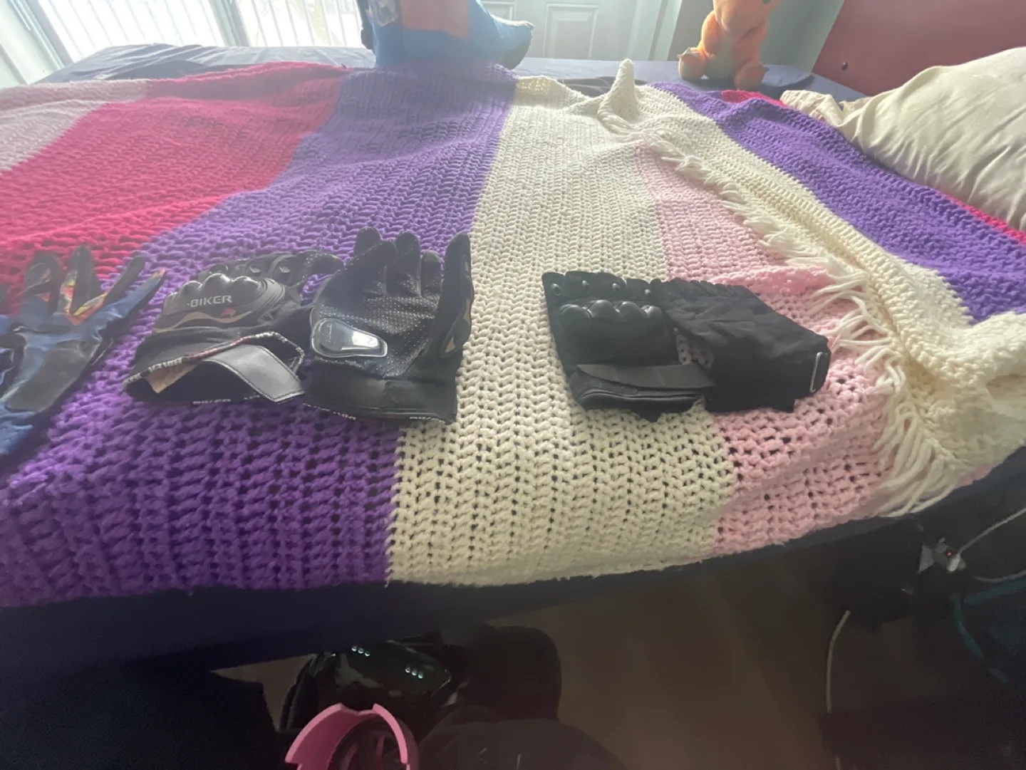 Three pairs of motorcycle gloves image indicator(2)