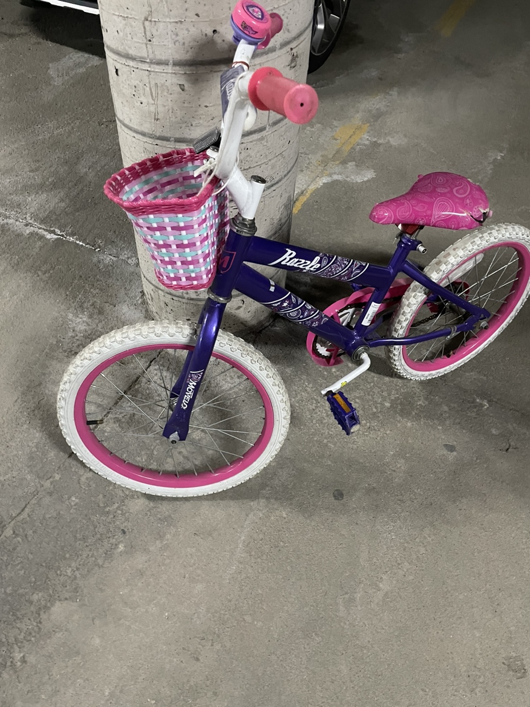 Girls' purple Razor bike with basket