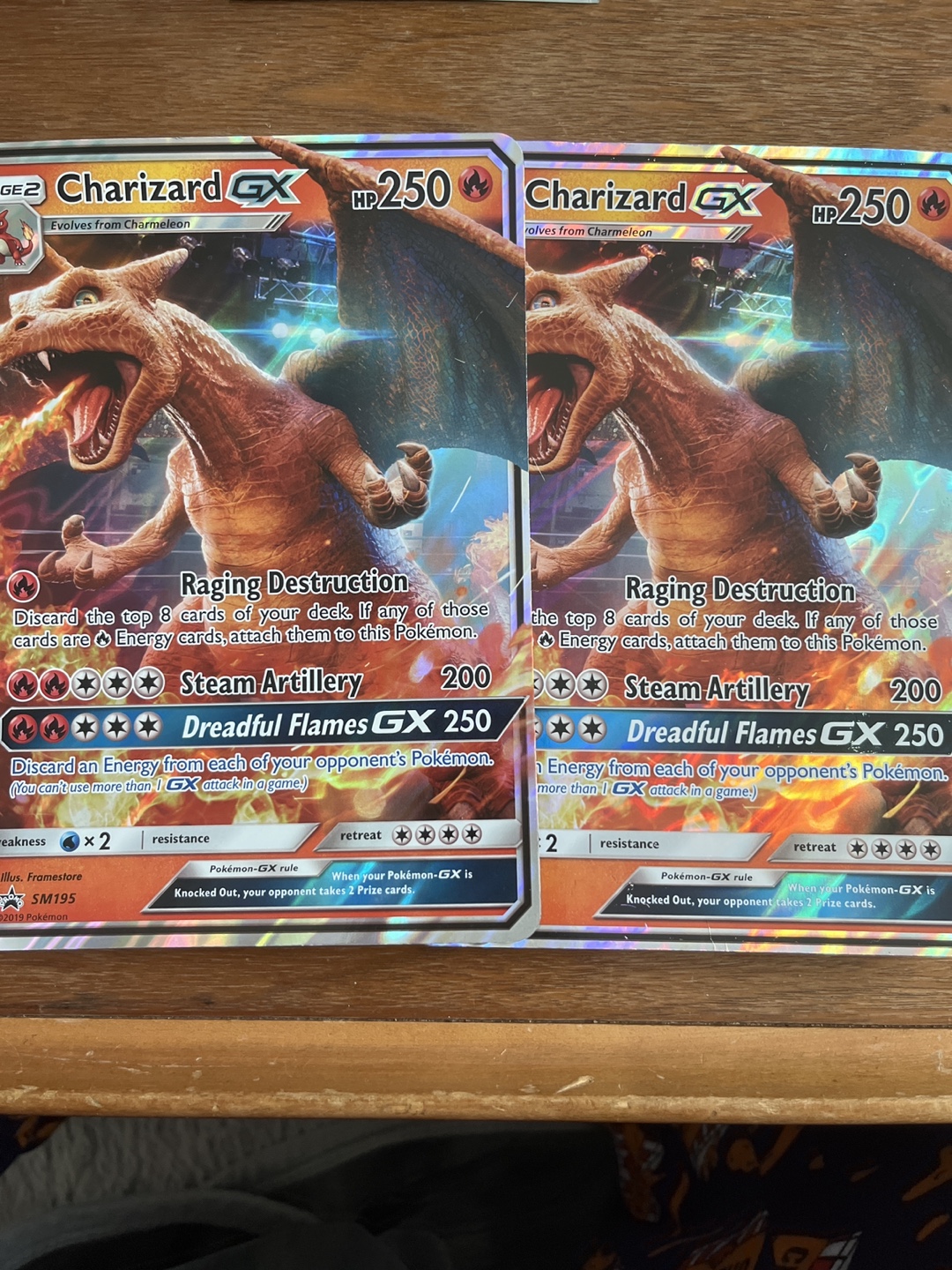 Pokemon Charizard GX Cards - 2x  SM195