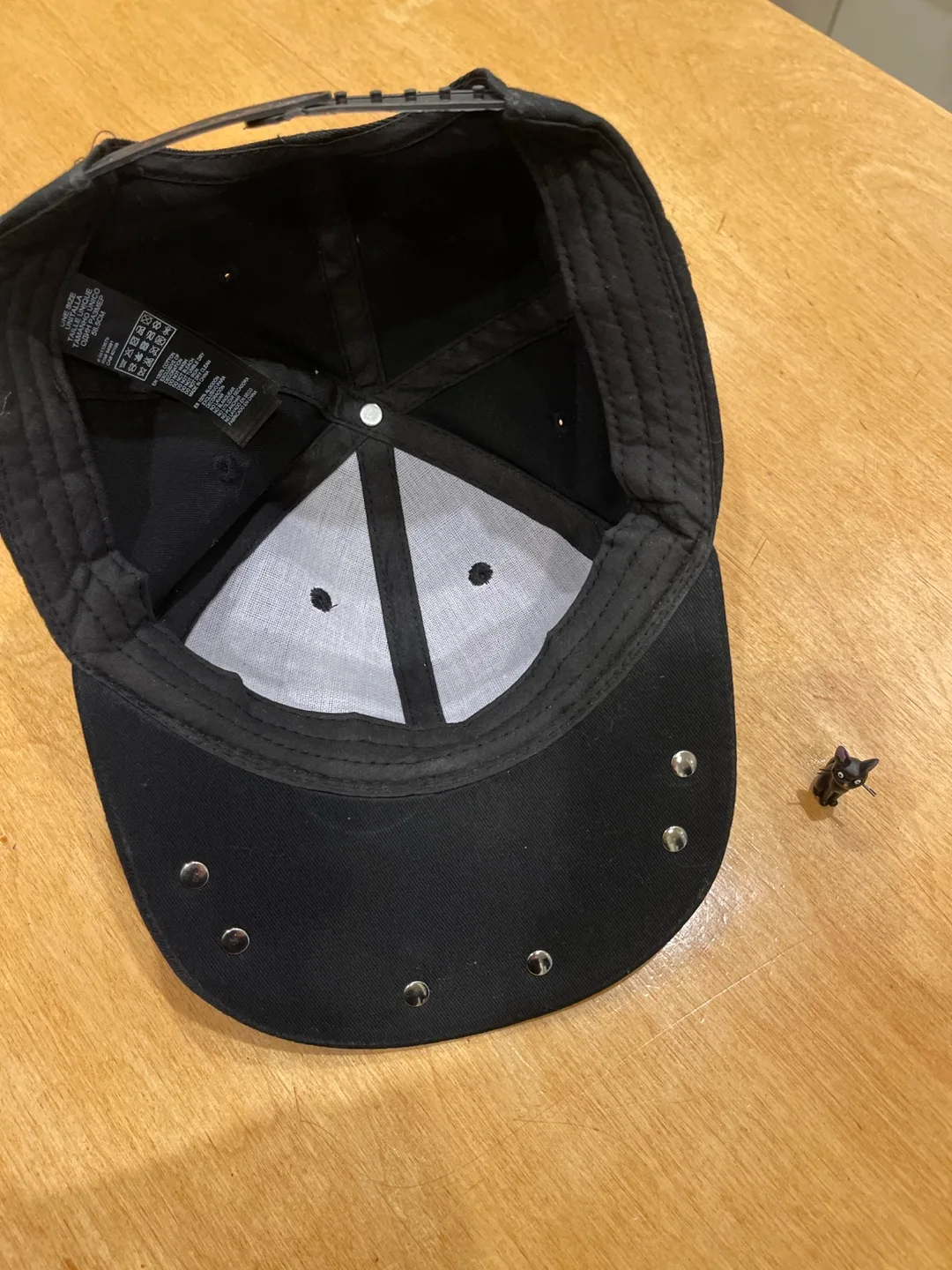 Black Baseball Cap with metal on brim image indicator(2)
