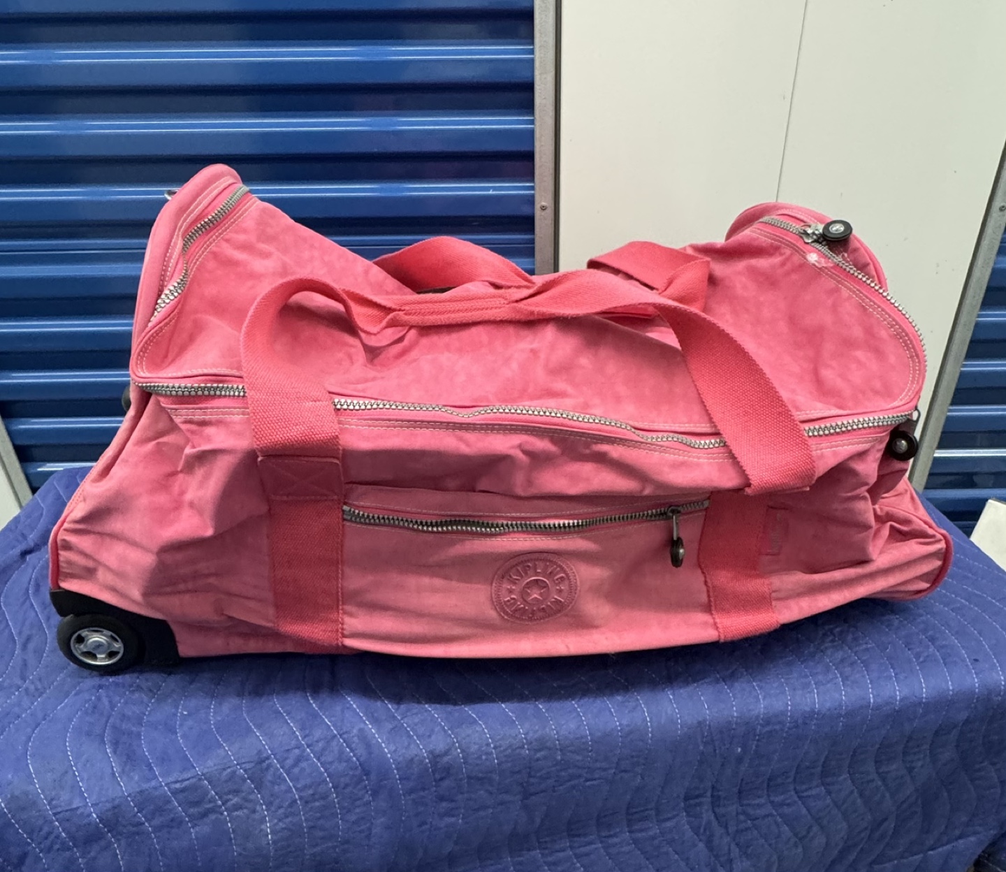 Pink Kipling Rolling Duffle Bag