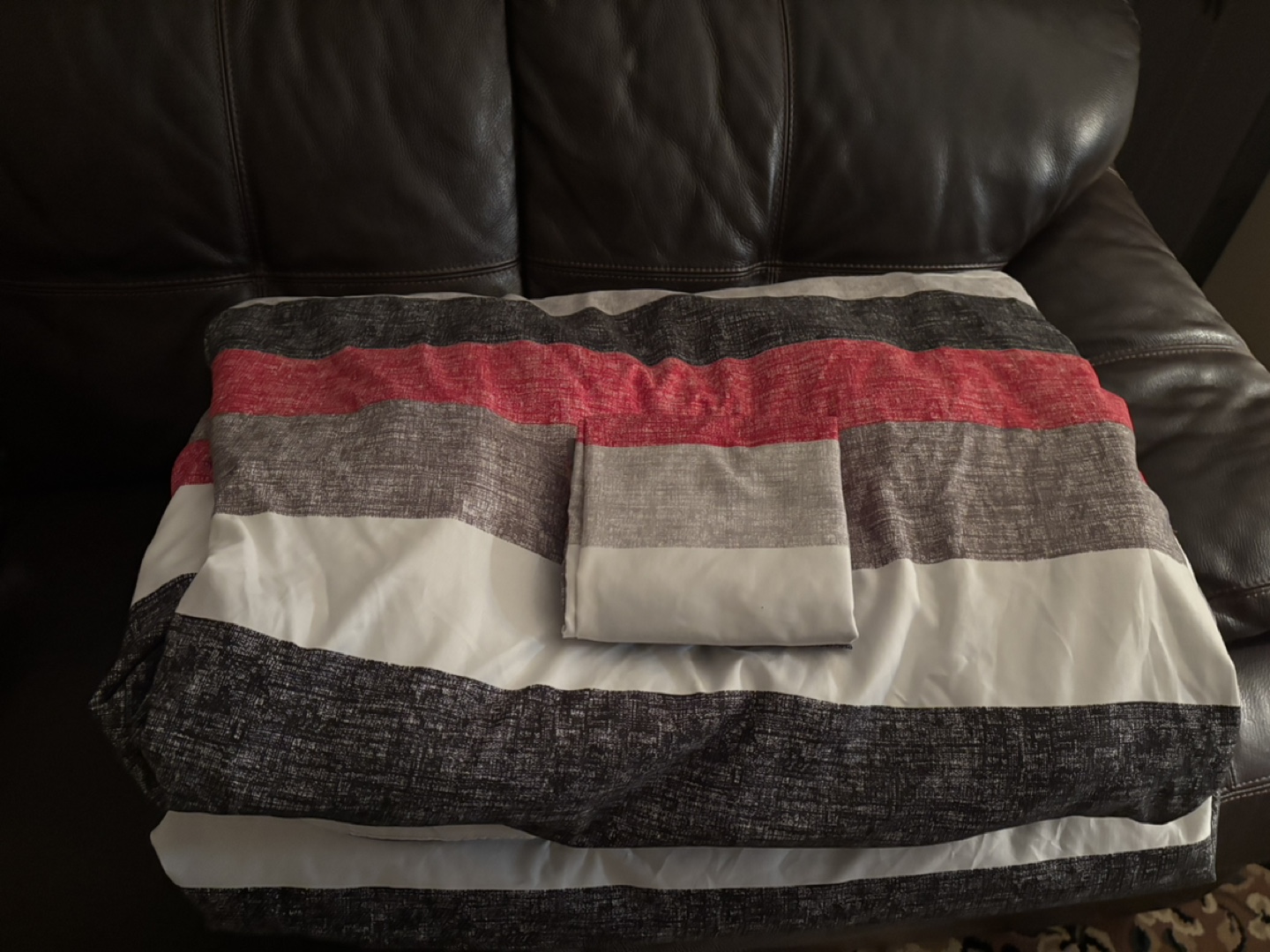Two identical comforter sets