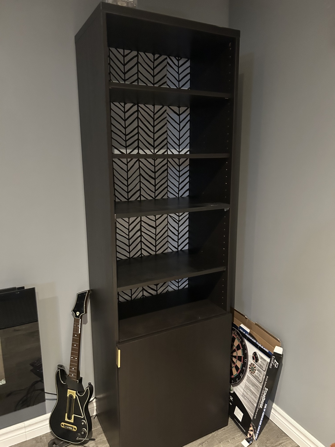 Tall dark brown bookshelf with herringbone patterned back - photo 2