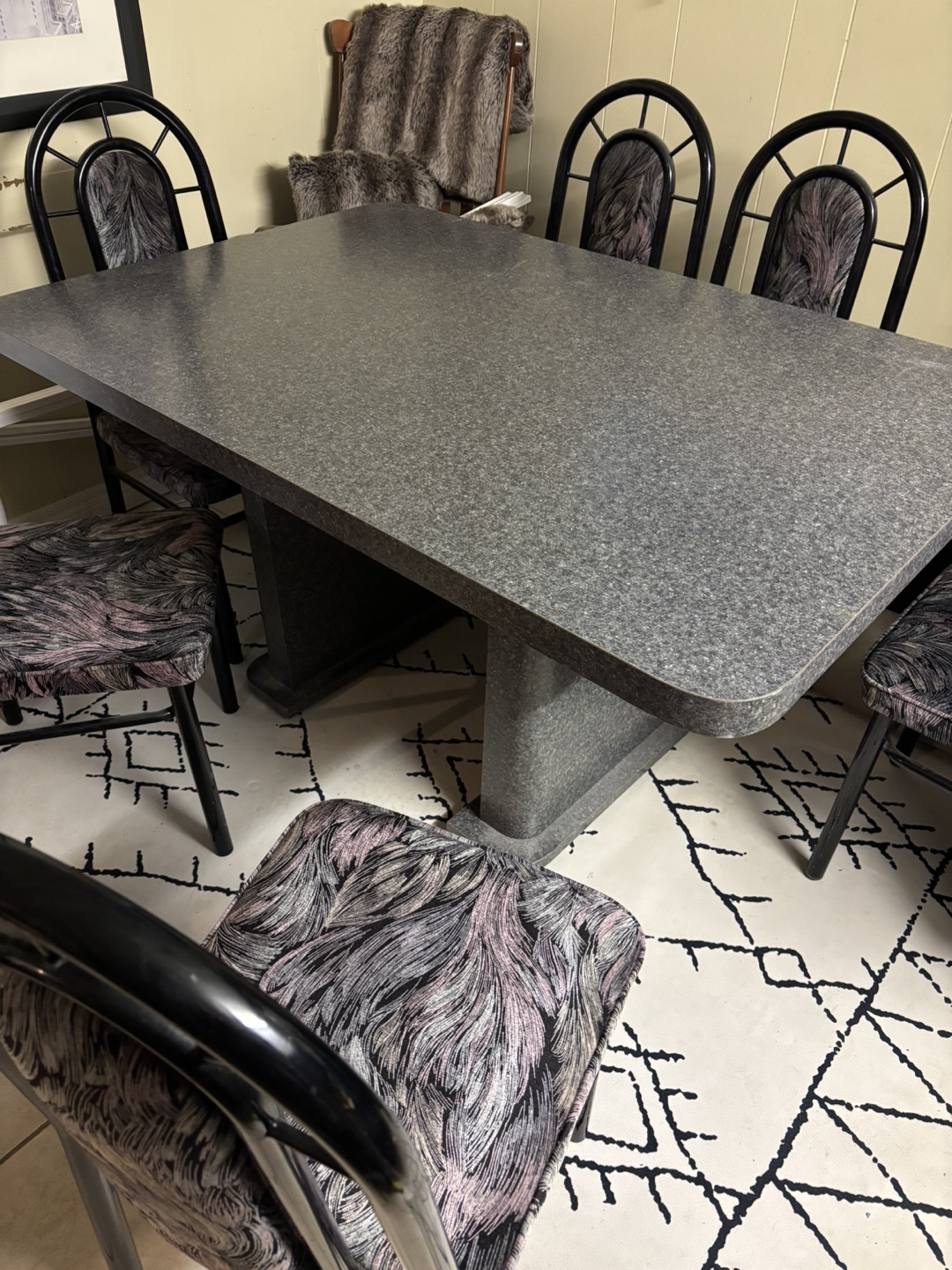 Grey laminate dining table and six chairs
