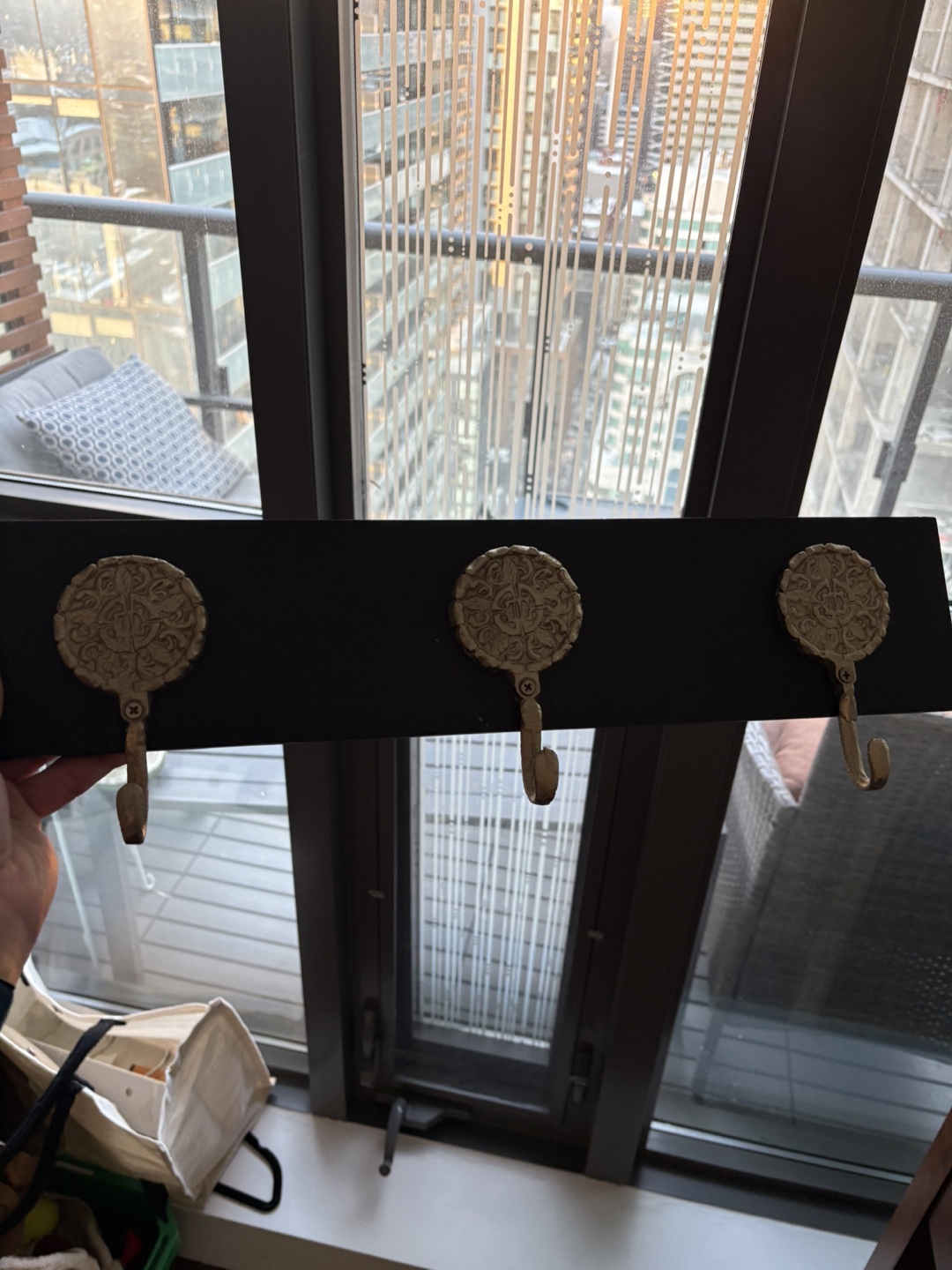 Black Wall Mounted Hook Rack with Three Ornate Hooks