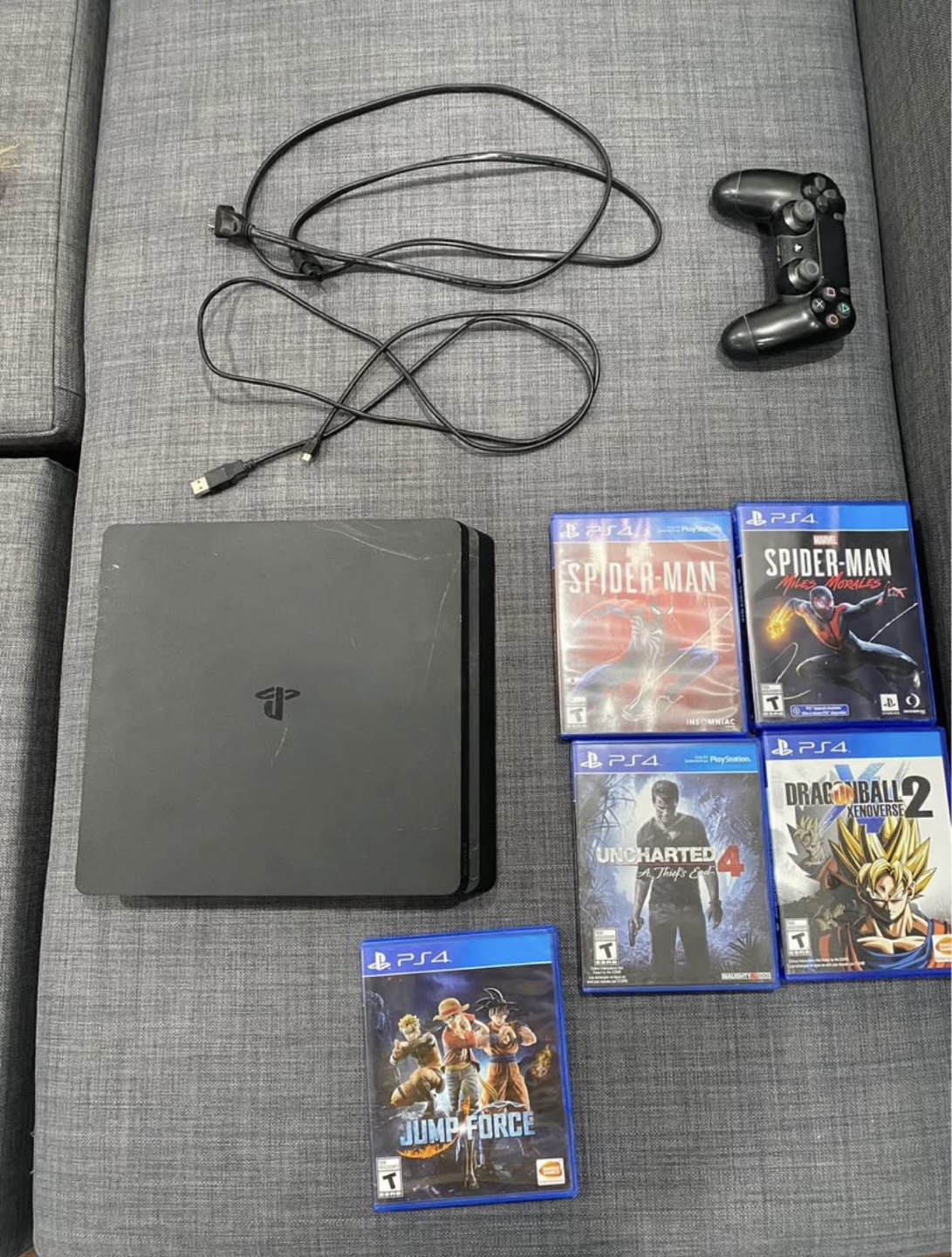 PlayStation 4 Slim Console with 5 Games and Controller