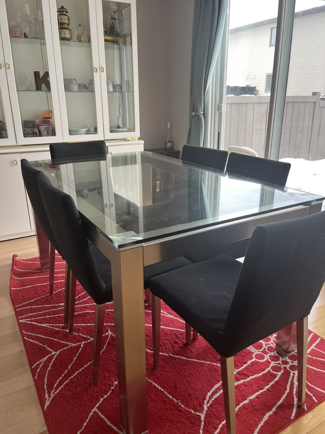 Glass top dining table with six chairs