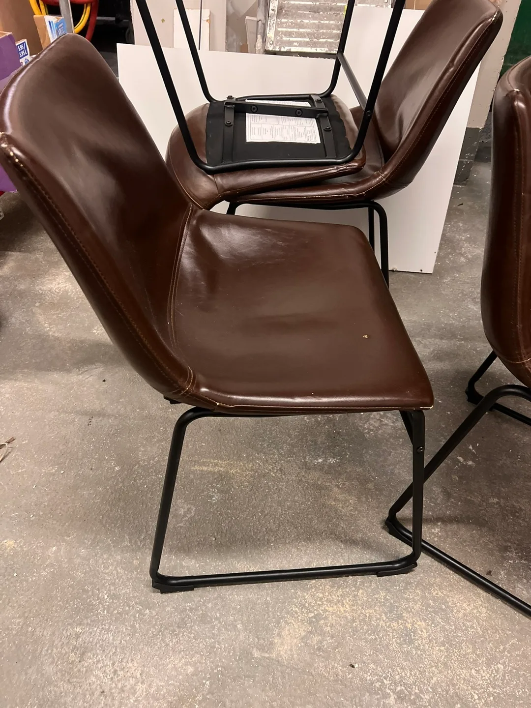 Set of Four Brown Leather Dining Chairs with Black Metal Legs image indicator(2)
