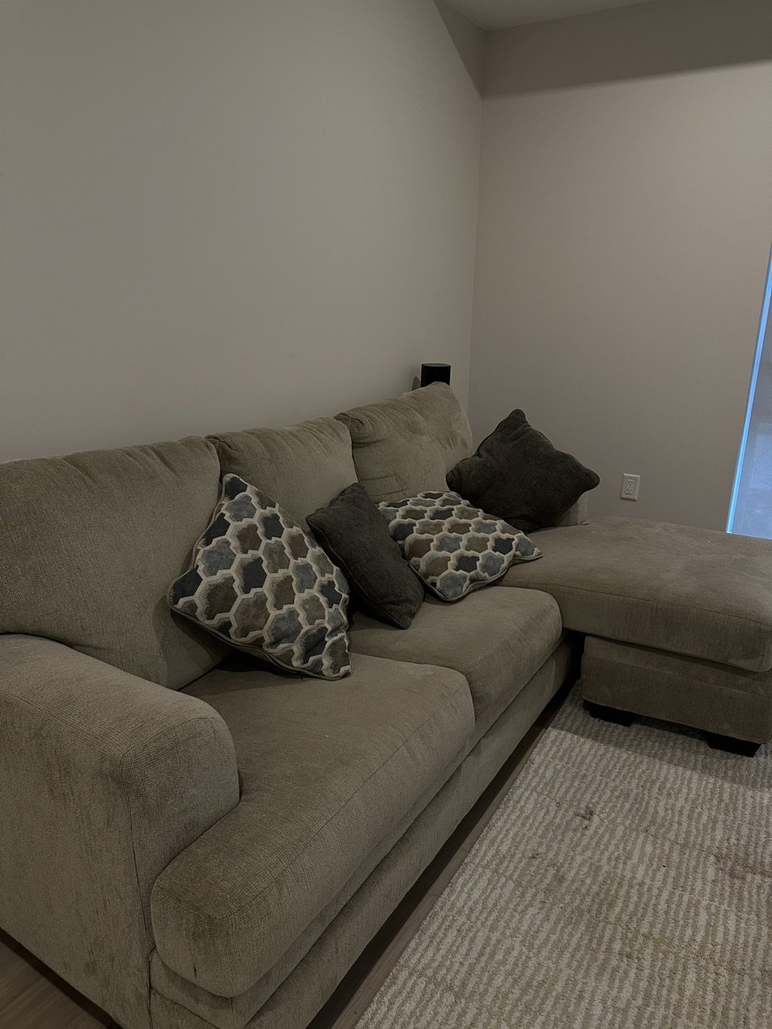 Beige Sectional Sofa with Pillows