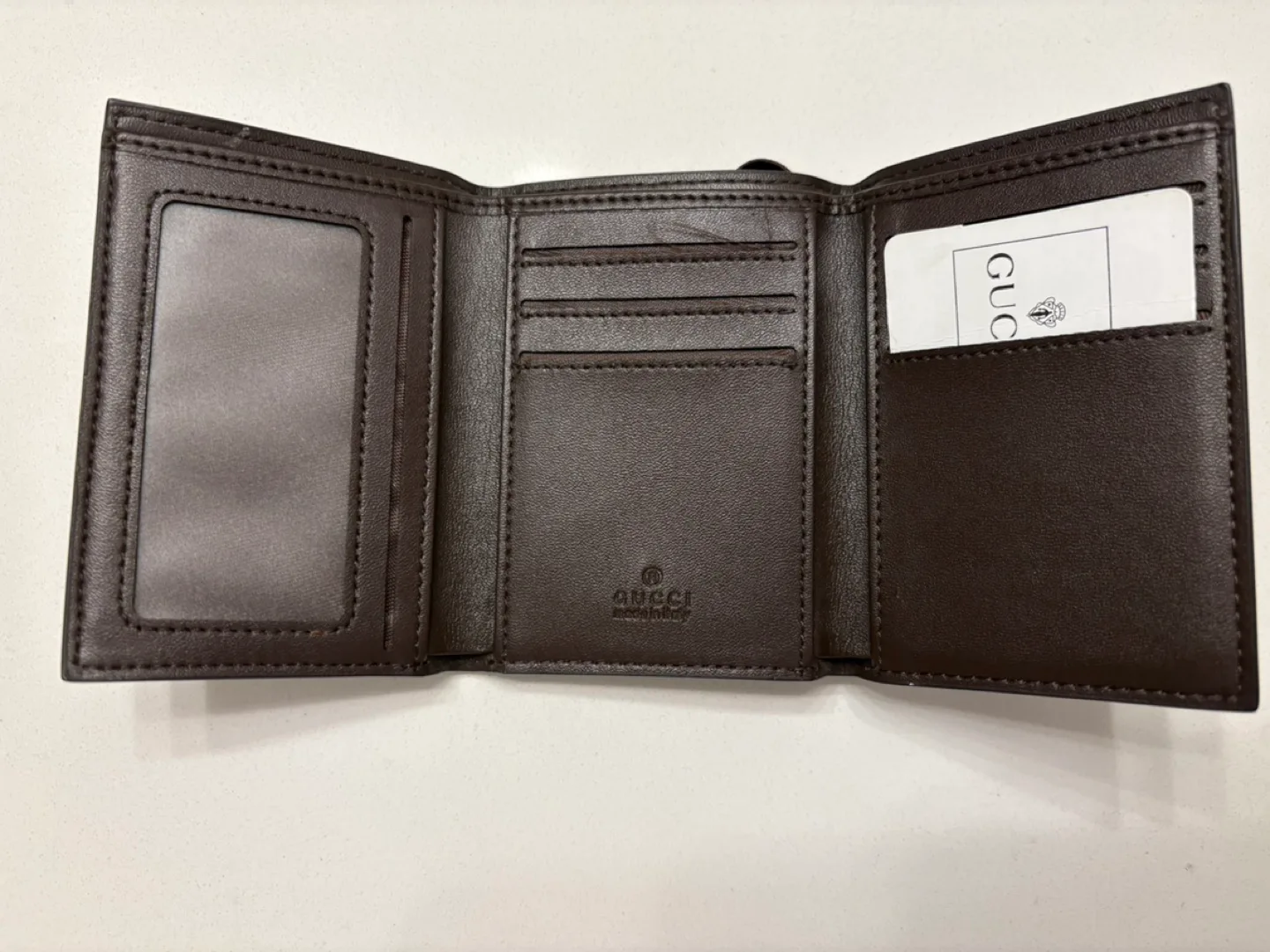 Gucci Men's Brown Leather Trifold Wallet image indicator(3)