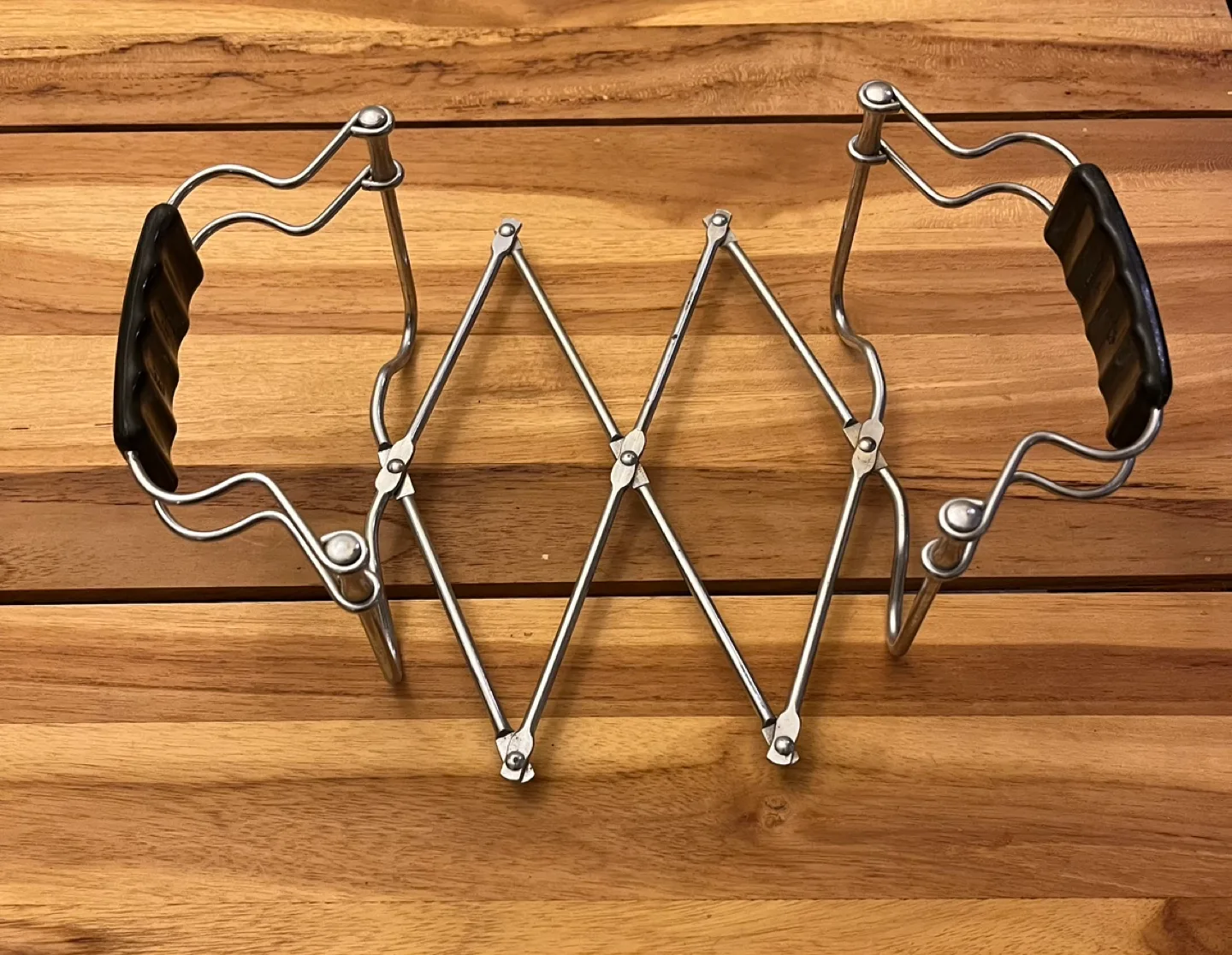 Vintage Expandable Metal Trivet/Casserole Holder image indicator(2)