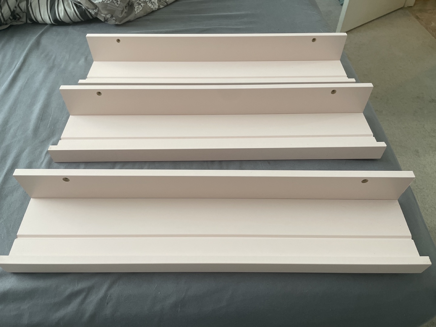 Three IKEA Mosslanda Pink Shelves