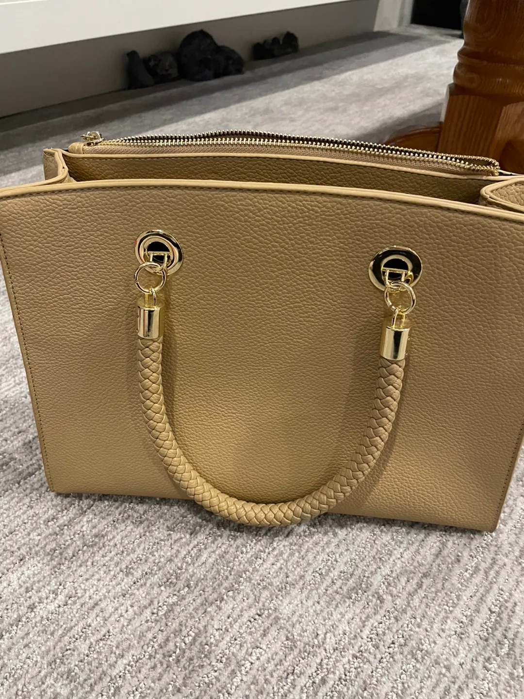 Beige satchel handbag with braided handles image indicator(3)