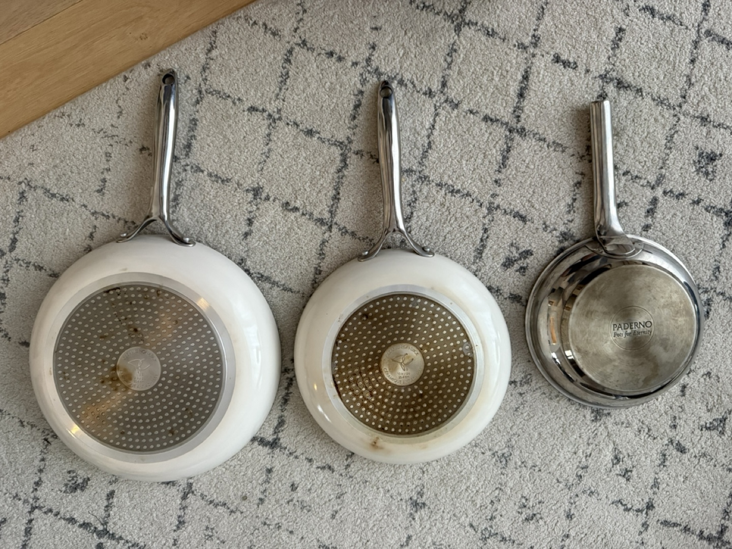 Three frying pans; two ceramic, one non-stick