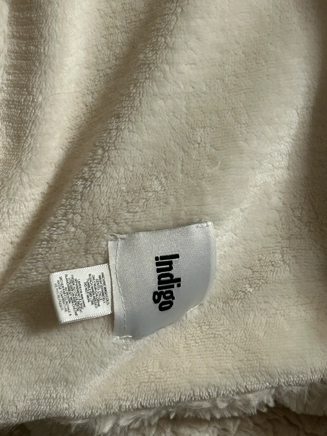 Cream-coloured Indigo faux Throw Blanket image indicator(2)