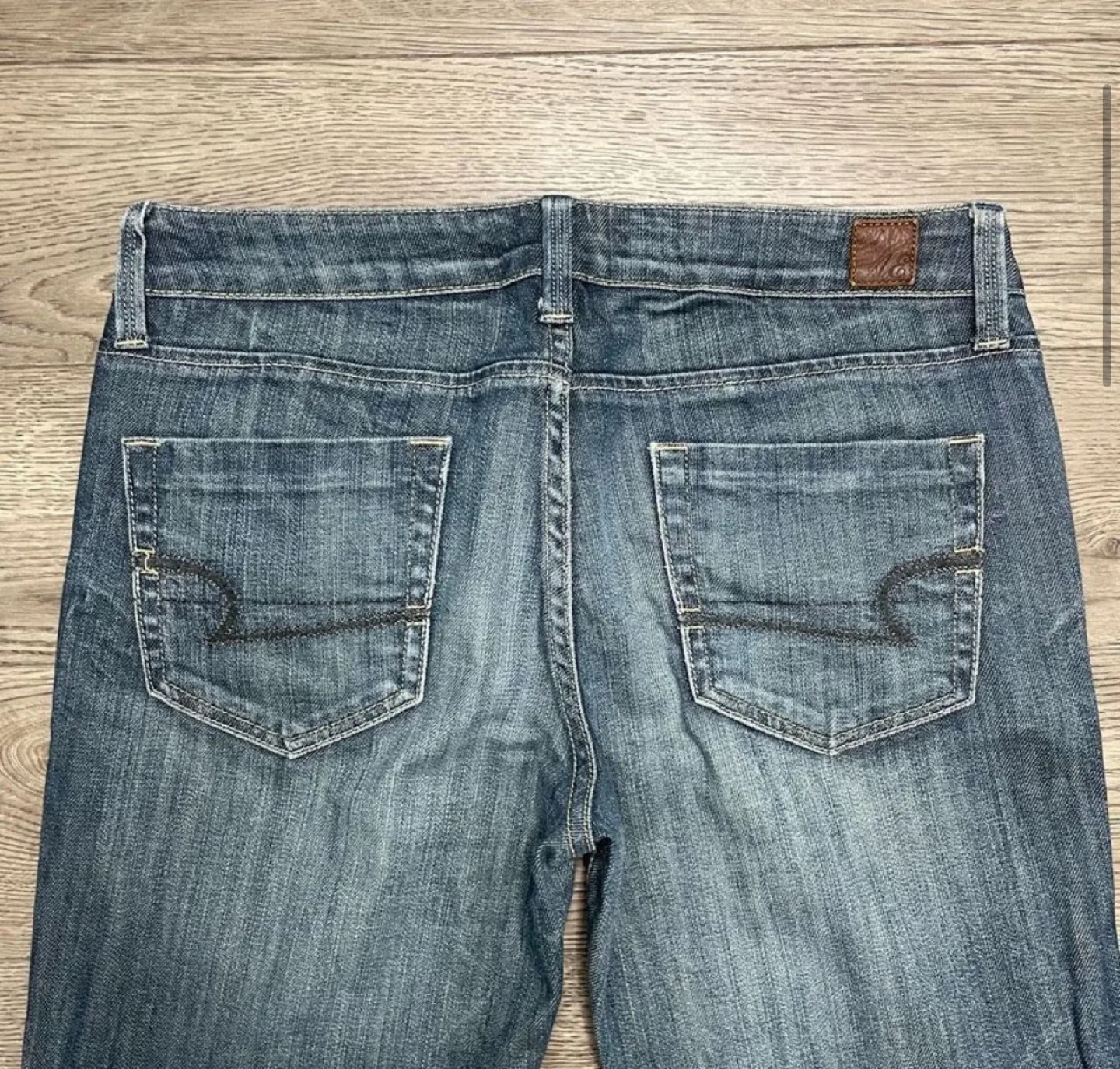 Y2K low rise bootcut jeans image indicator(4)