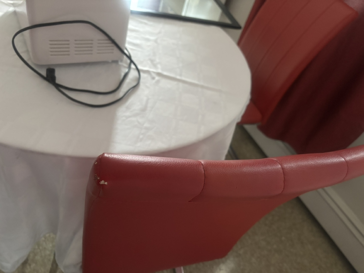 Glass-top dining table and four red chairs - photo 4