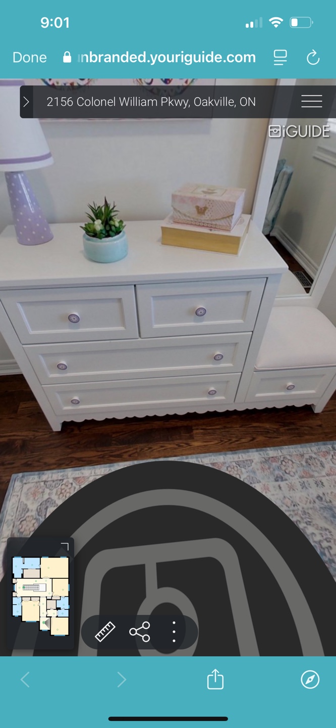 White dresser with lavender knobs