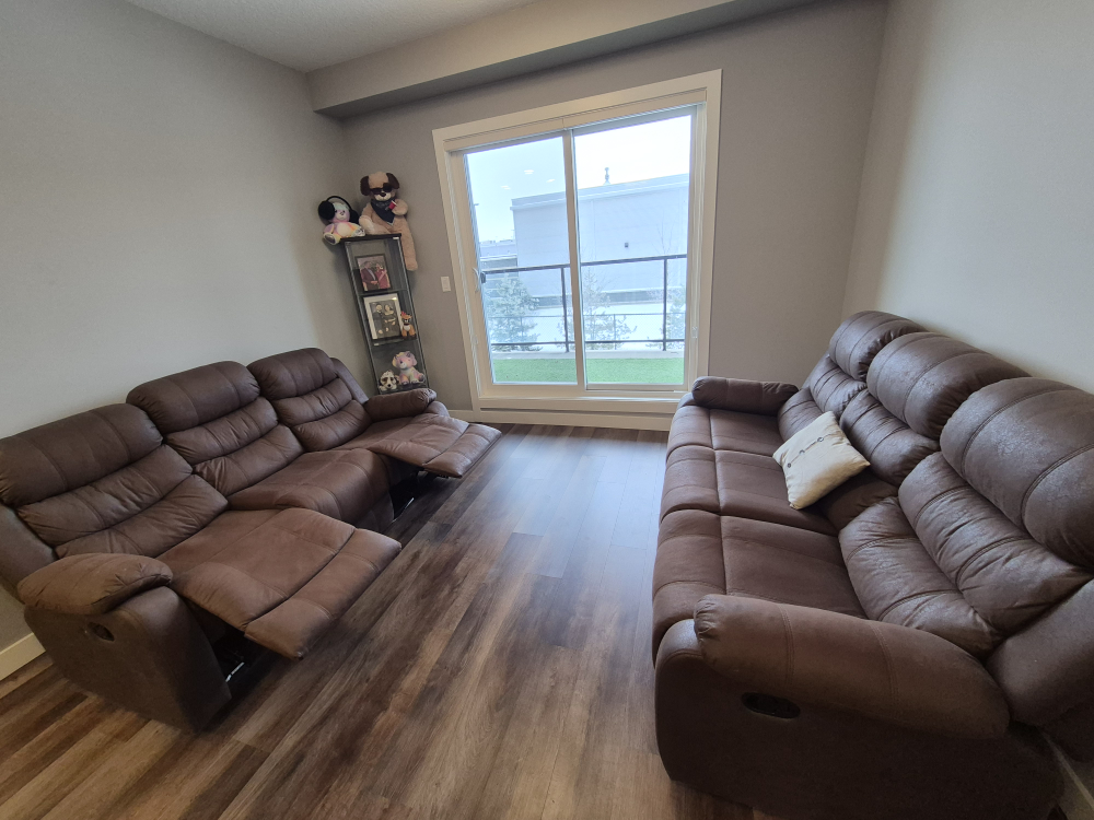 Brown Reclining Sofa
