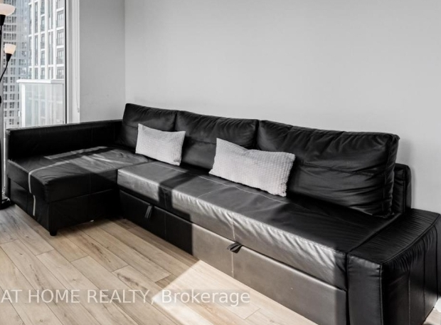 Black Leather L-Shaped Sofa Bed