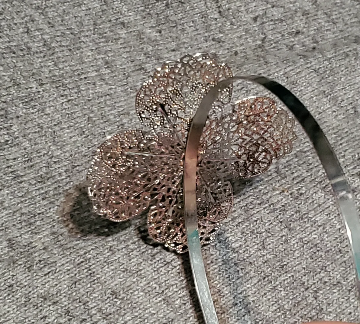 Assorted Headbands: Black Rhinestone, Pink Floral, Silver Flower image indicator(10)