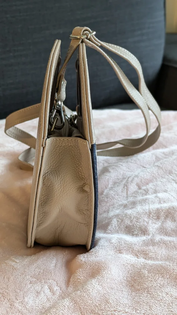 NEW Beige handmade leather embroidered mini round crossbody bag. image indicator(5)