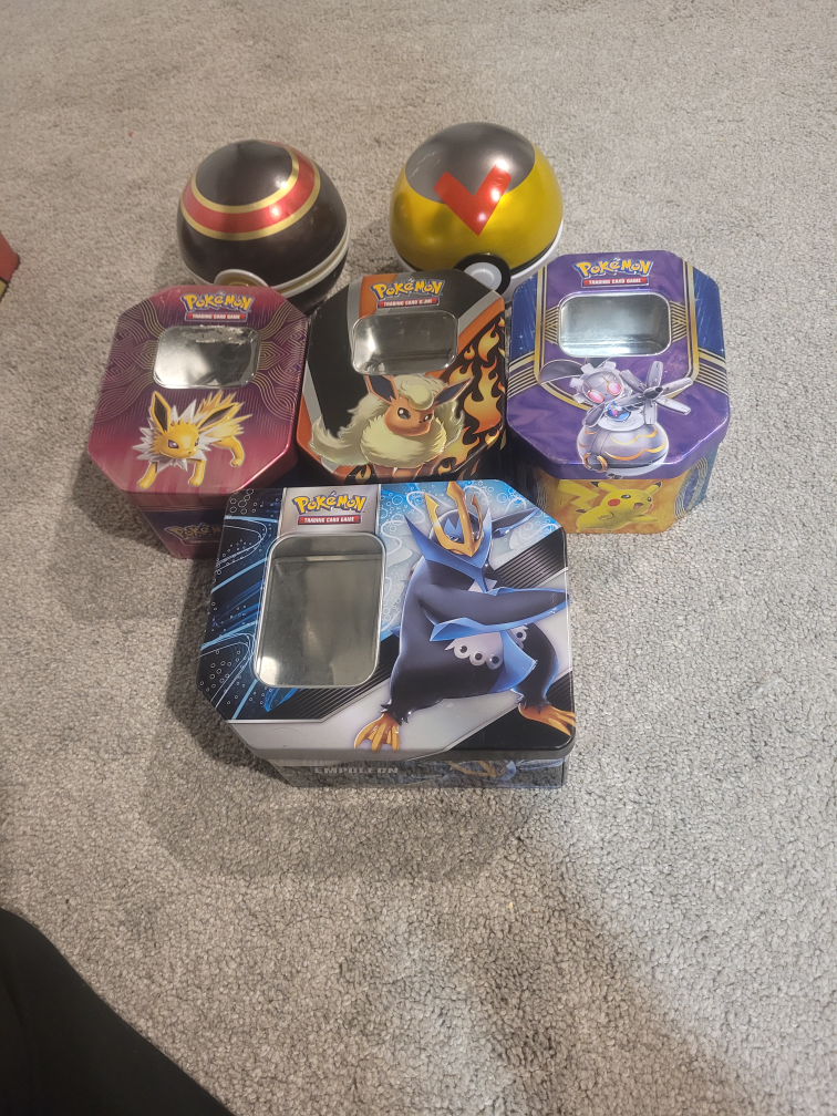 Pokemon tins and two poke balls - photo 2
