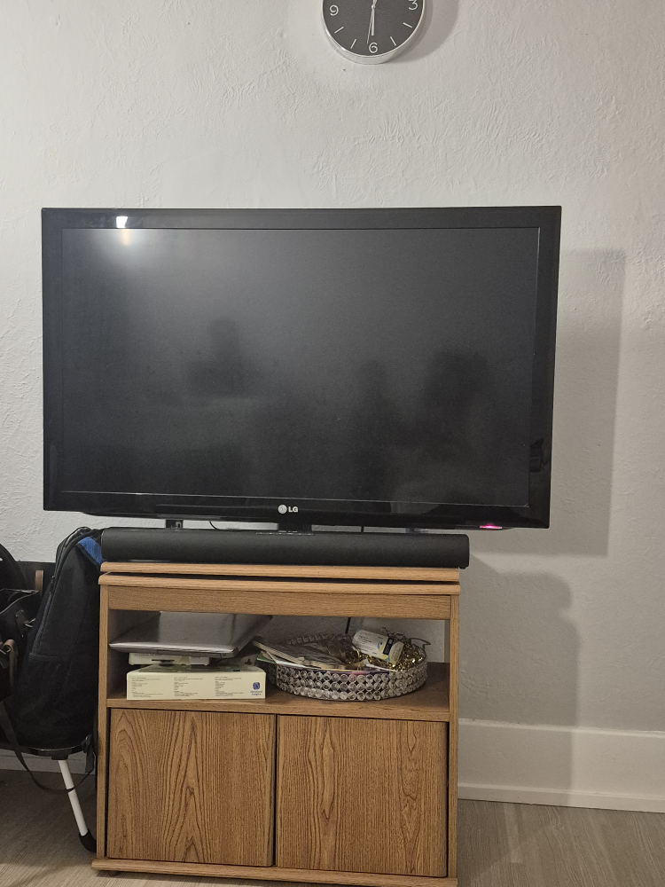 LG Flat Screen TV with Soundbar