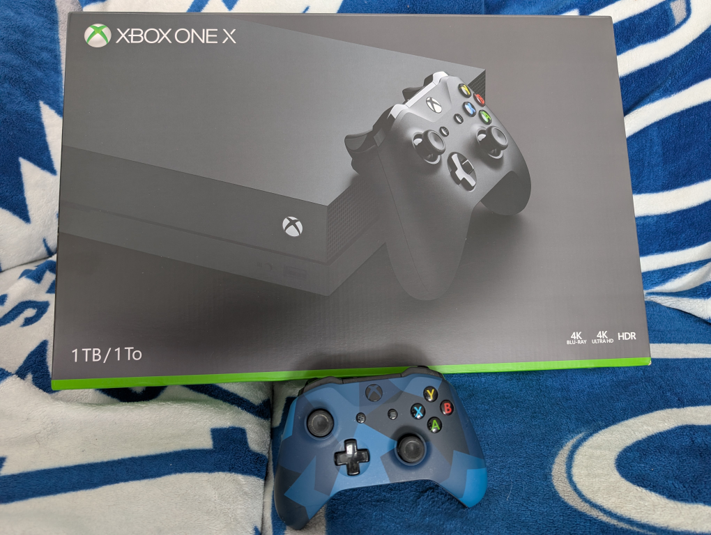 Xbox One X 1TB Console with Two Controllers - photo 2
