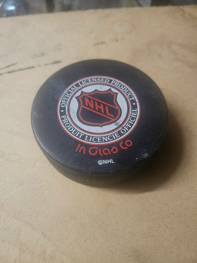 Calgary Flames Official Game NHL Puck image indicator(2)