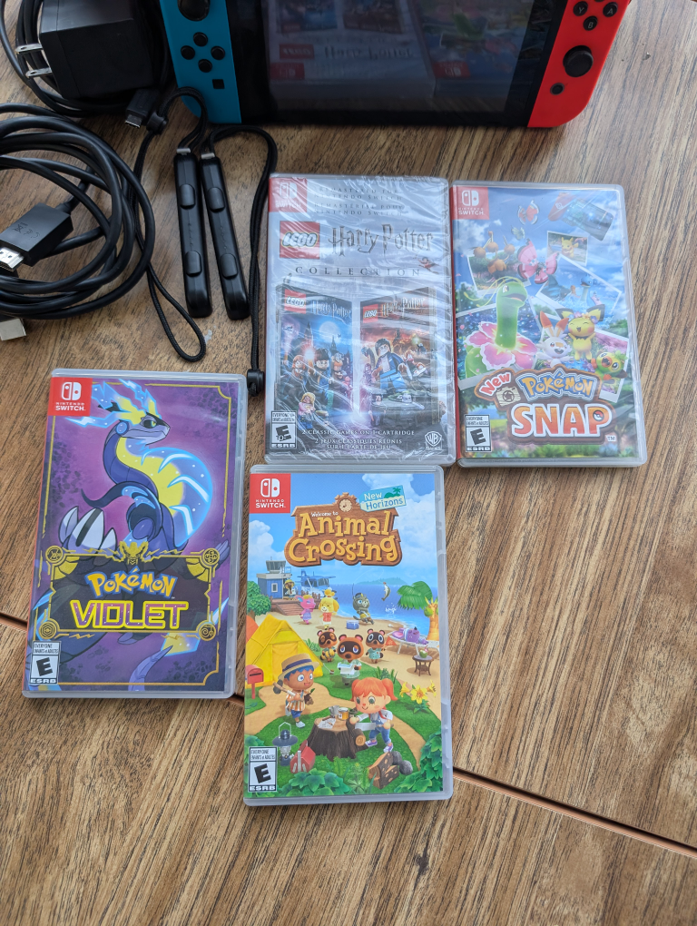 Nintendo Switch Console with Games and Accessories - photo 2