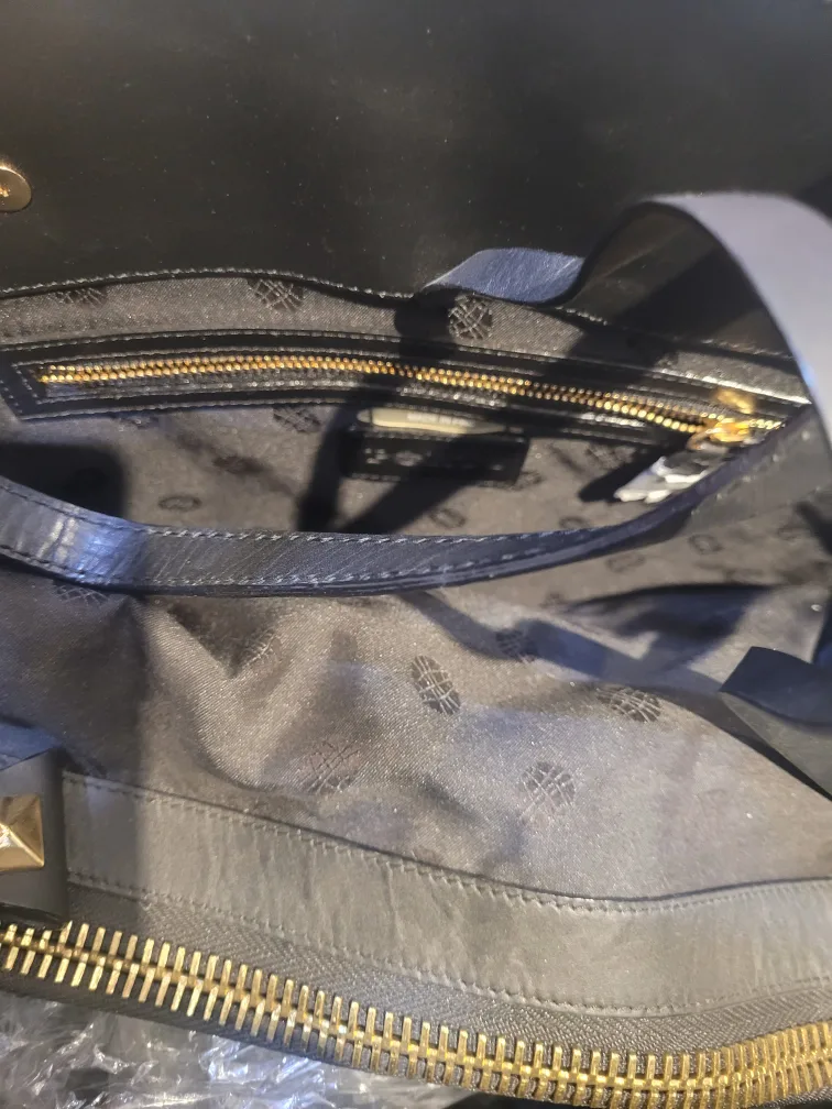 Black Leather Handbag with Gold Accents image indicator(2)