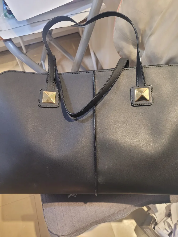 Black Leather Handbag with Gold Accents image indicator(3)