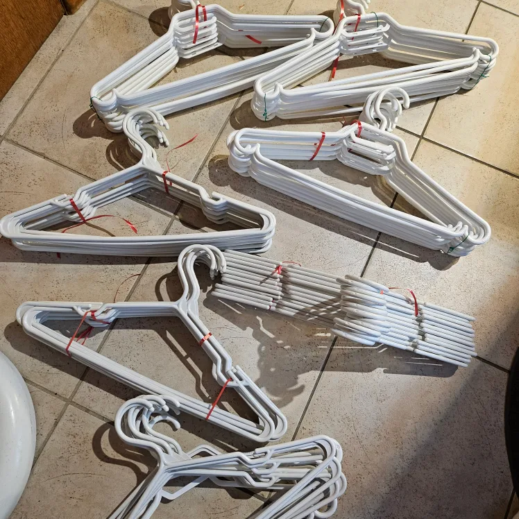 Bulk Lot of White Plastic Hangers image indicator(2)