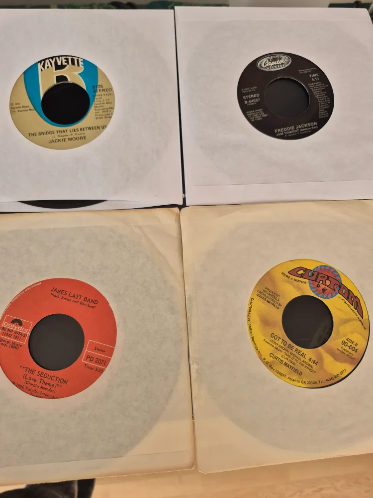 Collection of 12 Vintage 45 RPM Records image indicator(7)