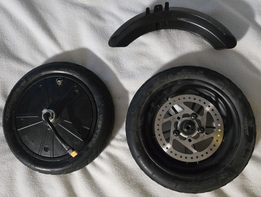 Rear wheel, motor and fender of electric scooter.