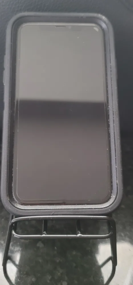 Black iPhone 11 with Otter box Phone Case