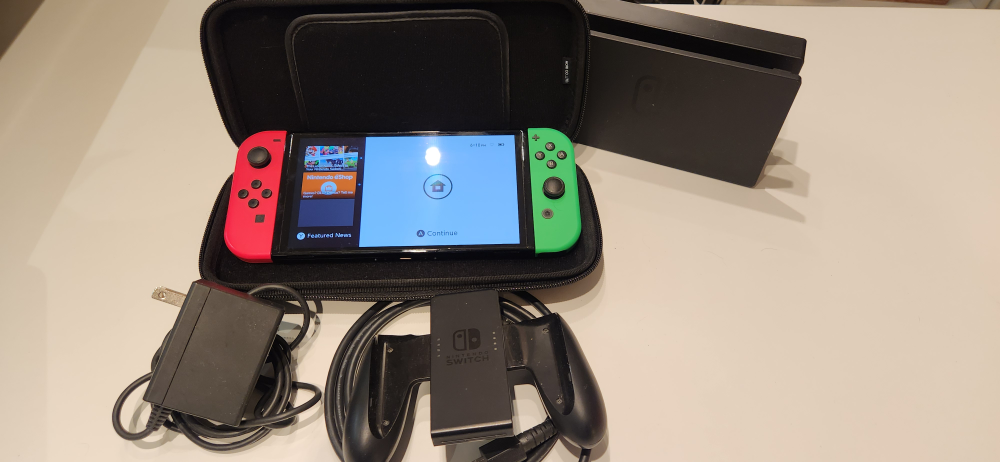 Nintendo Switch OLED  with accesories - photo 2