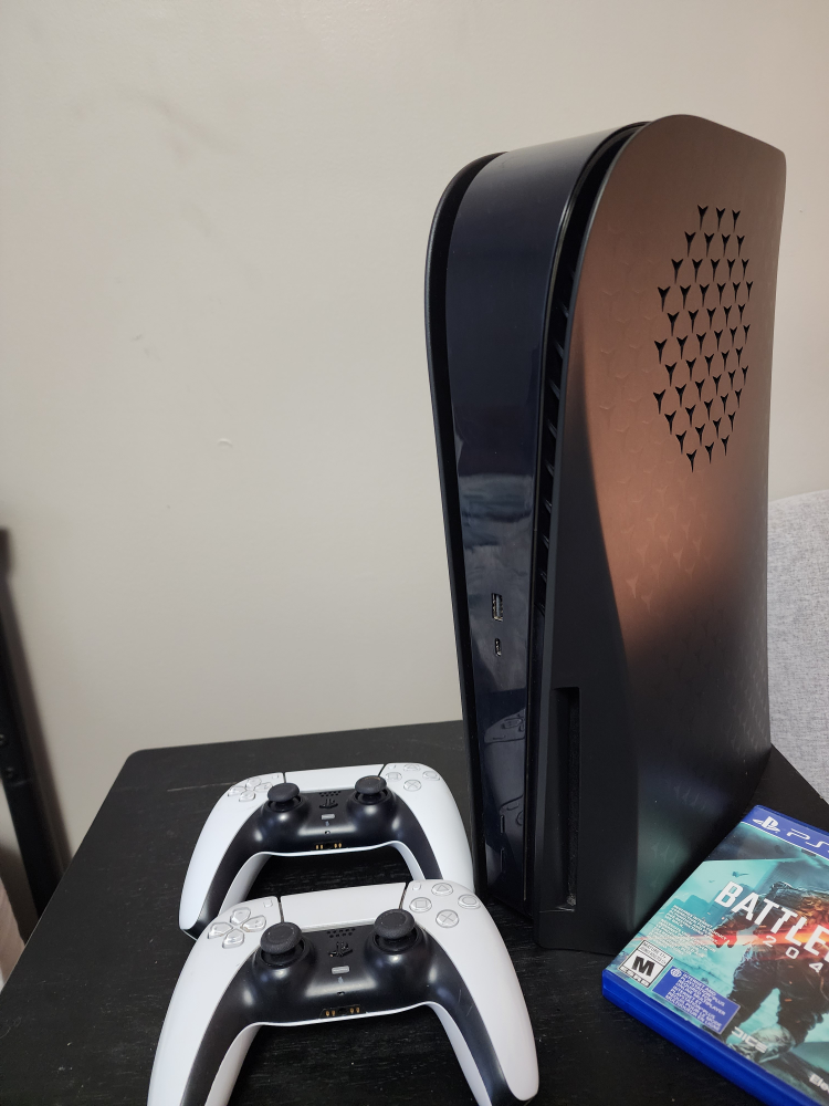 PlayStation 5 with Two Controllers and Battlefield 2042