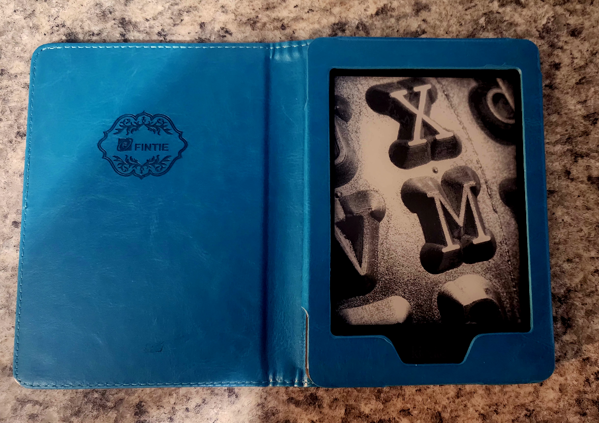Kindle e-reader with Fintie Case