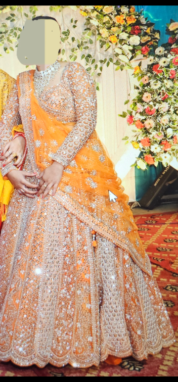 Gorgeous Orange and Silver Embellished Lehenga Choli