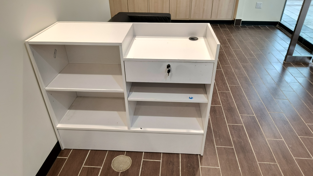 White Retail Counter with Shelves and Drawer