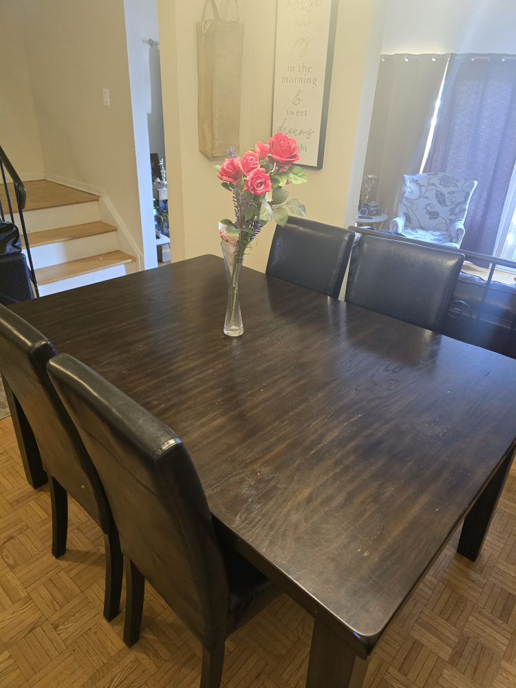 Dark Brown Wood Dining Table with 4 Black Leather Chairs