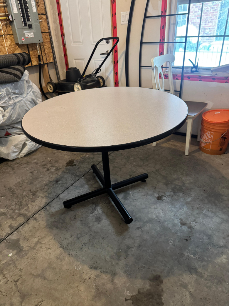Round Table with Black Pedestal Base