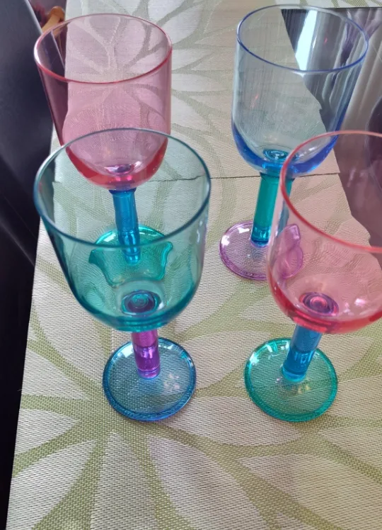 Set of four colourful wine/cocktail glasses image indicator(3)